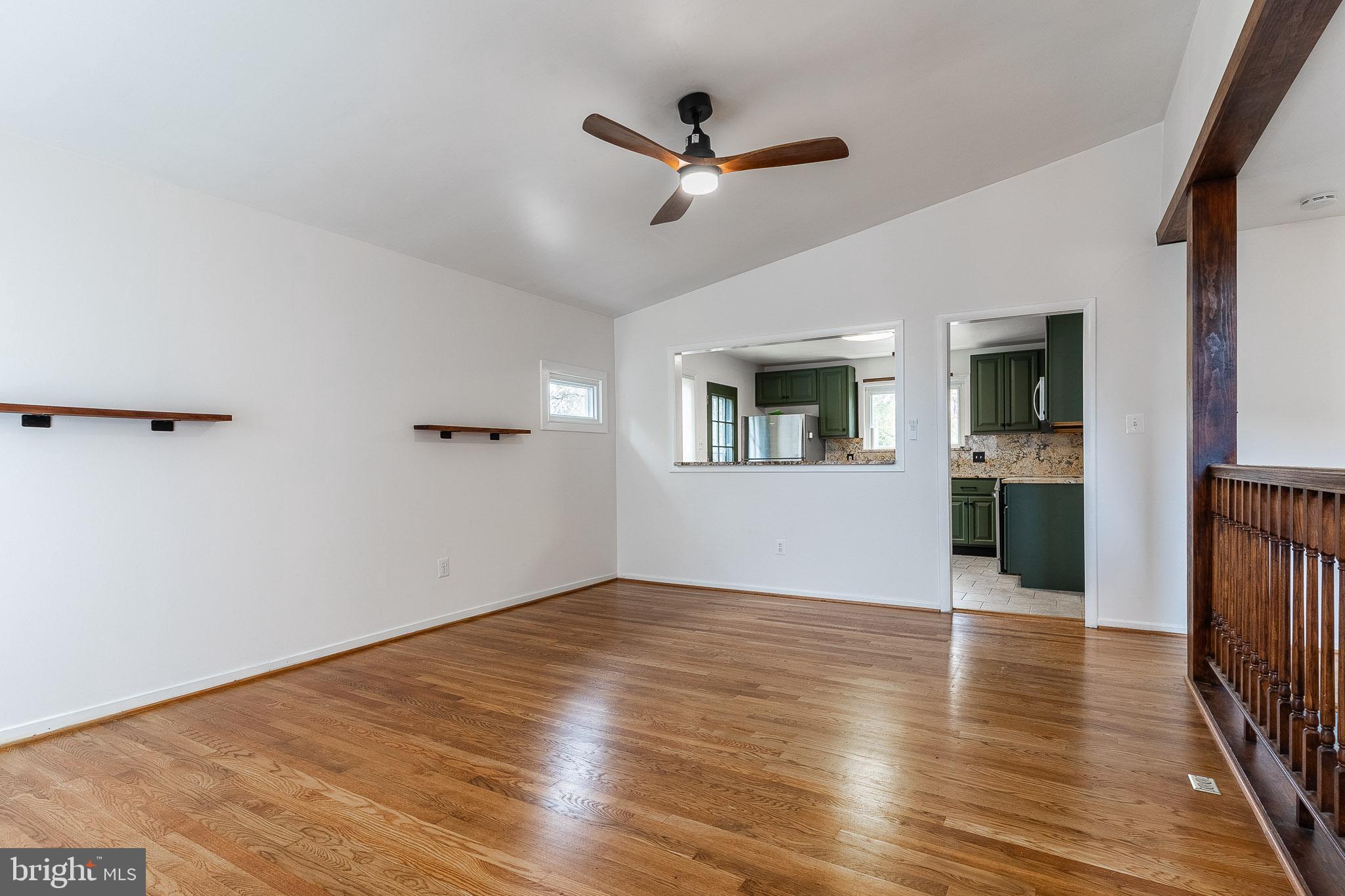 6609 Bowie Drive Springfield, VA 22150 - Photo 5 of 29 wooden floor in an empty room with a window