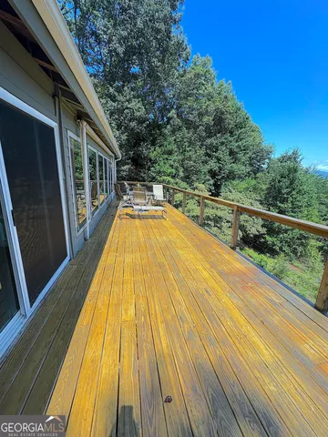 a view of a city with lush green forest