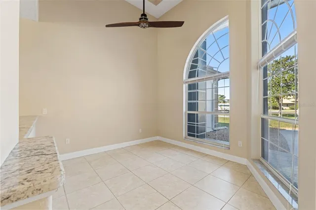 a view of an empty room with glass door