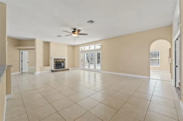 a bathroom with a granite countertop shower