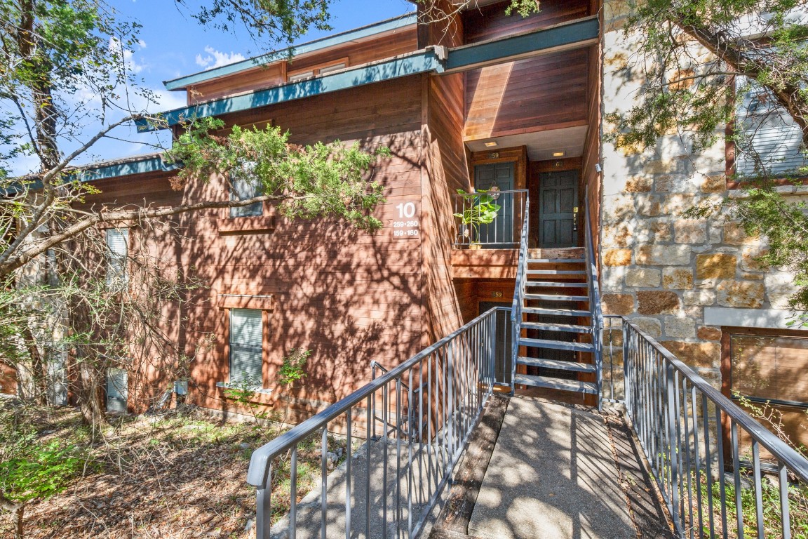 4711 Spicewood Springs Road, Unit 260 Austin, TX 78759 - Photo 20 of 20 a view of a balcony with wooden floor and fence