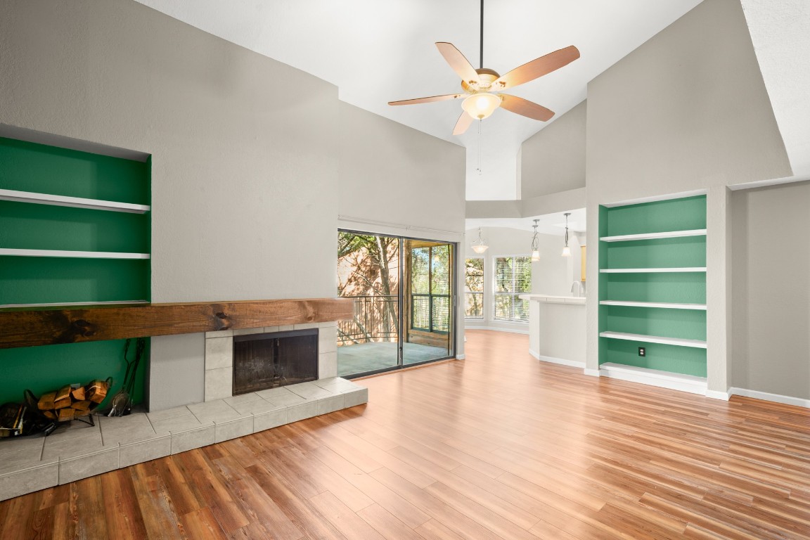 4711 Spicewood Springs Road, Unit 260 Austin, TX 78759 - Photo 2 of 20 a view of an empty room with a window and fireplace