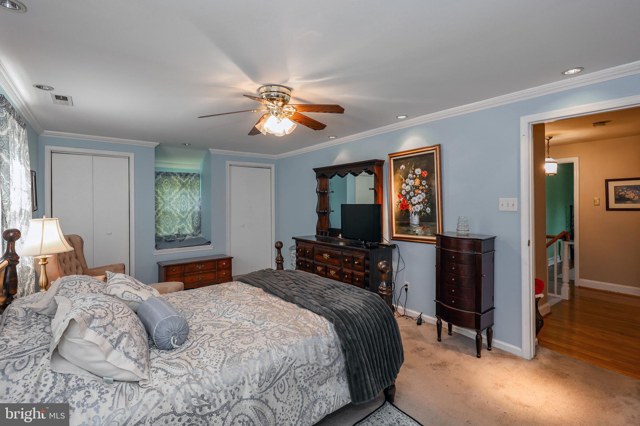 571 Rutherford Drive Springfield, PA 19064 - Photo 24 of 36 a bedroom with a bed and a chandelier