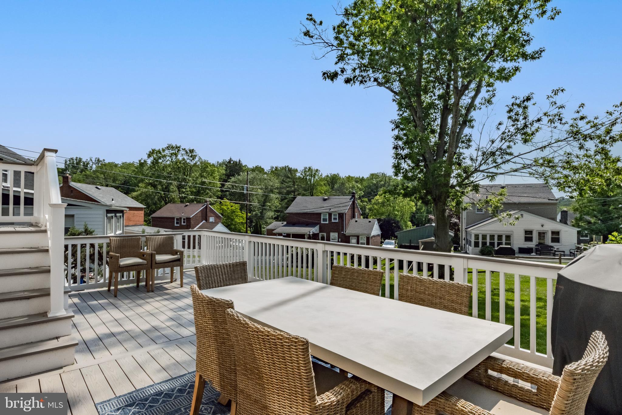 571 Rutherford Drive Springfield, PA 19064 - Photo 35 of 36 a view of a chairs and table on the deck