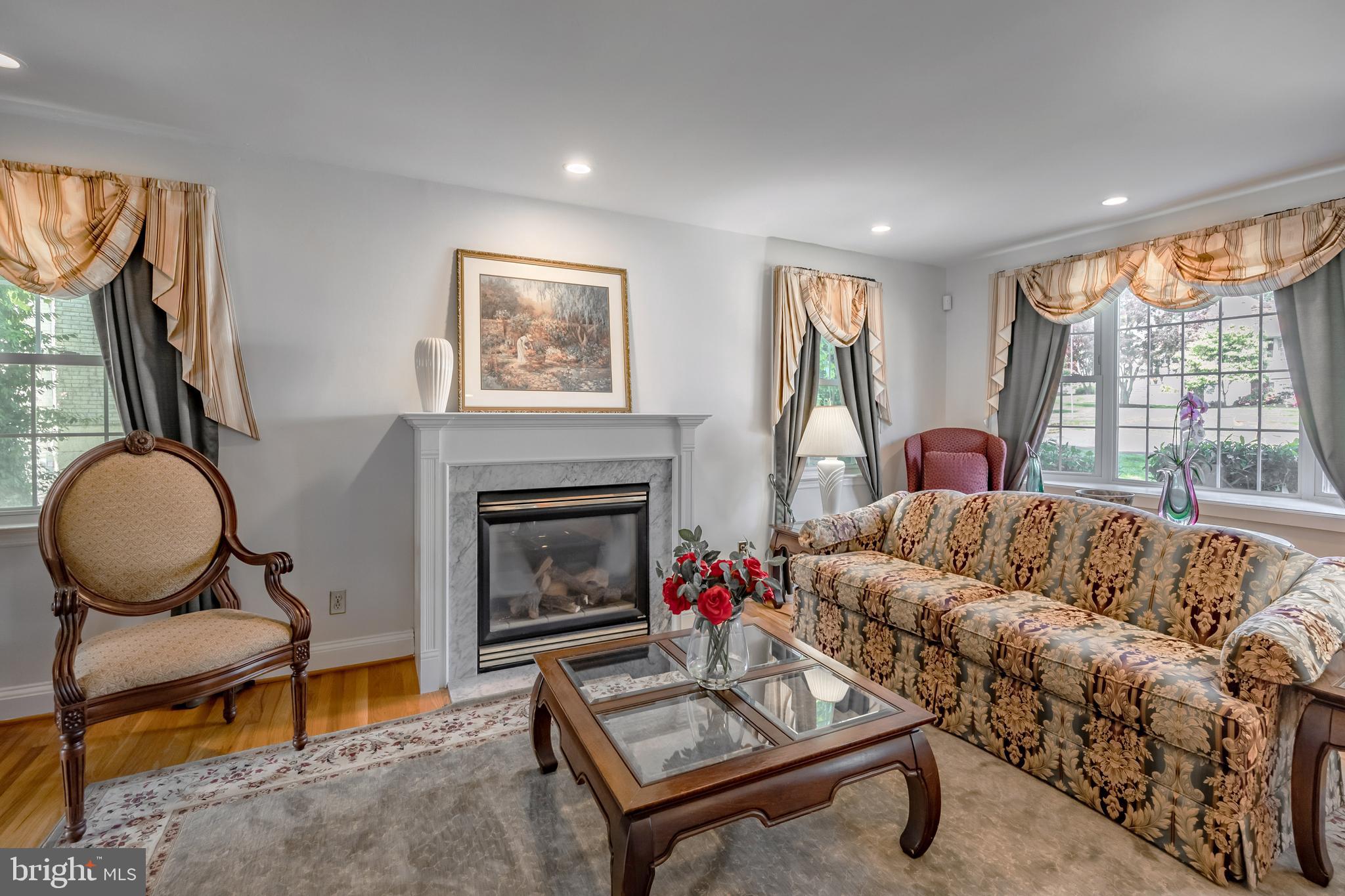 571 Rutherford Drive Springfield, PA 19064 - Photo 4 of 36 a living room with furniture and a fireplace