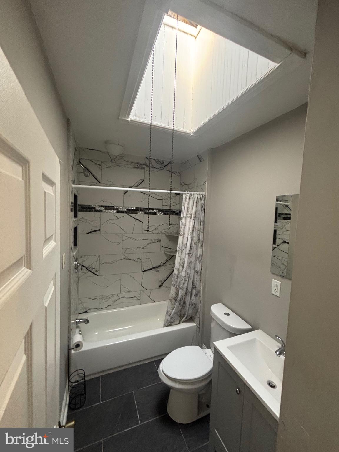 5807 Master Street Philadelphia, PA 19131 - Photo 11 of 21 a bathroom with a sink toilet and shower