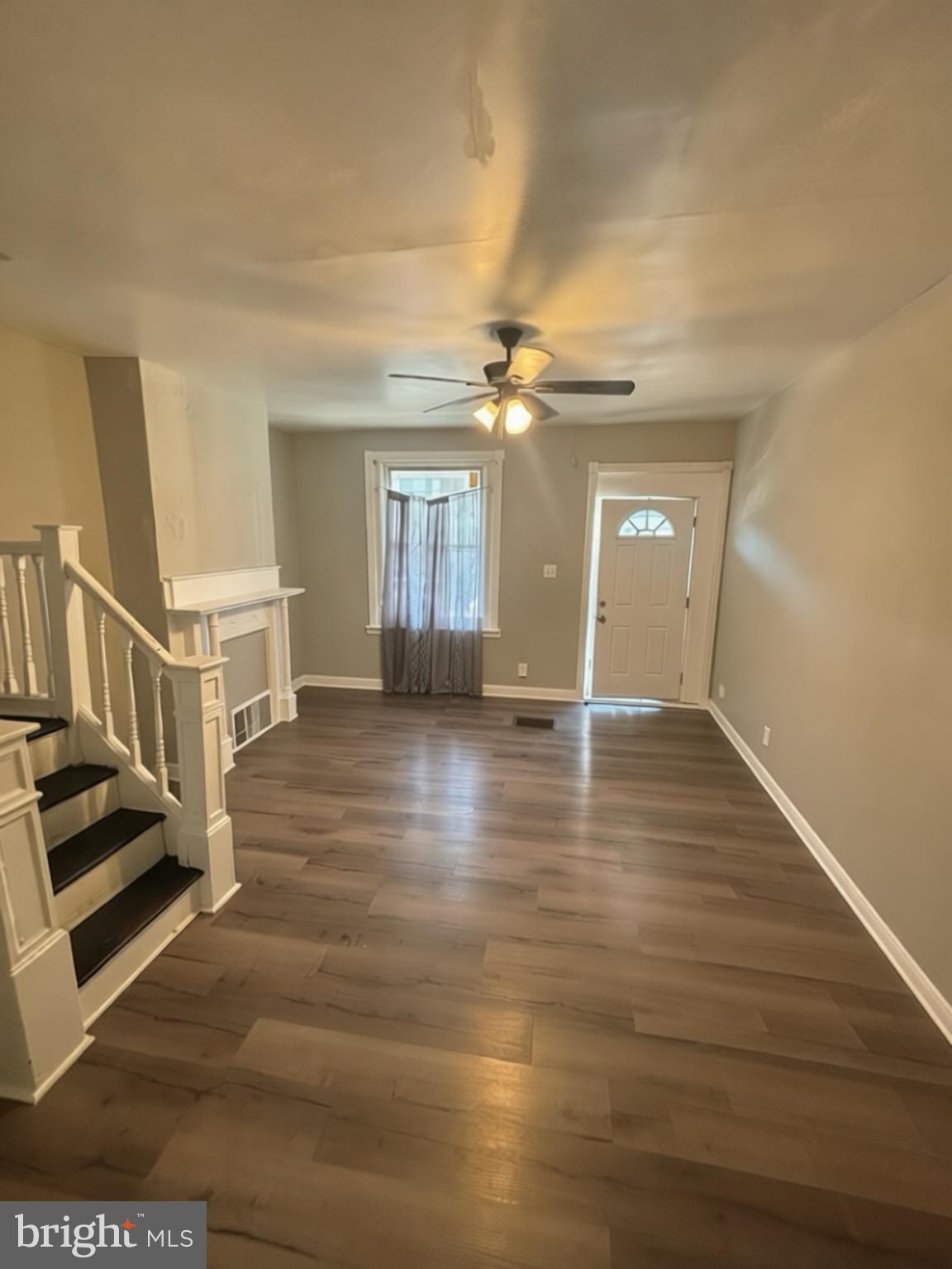 5807 Master Street Philadelphia, PA 19131 - Photo 2 of 21 an empty room with wooden floor and windows