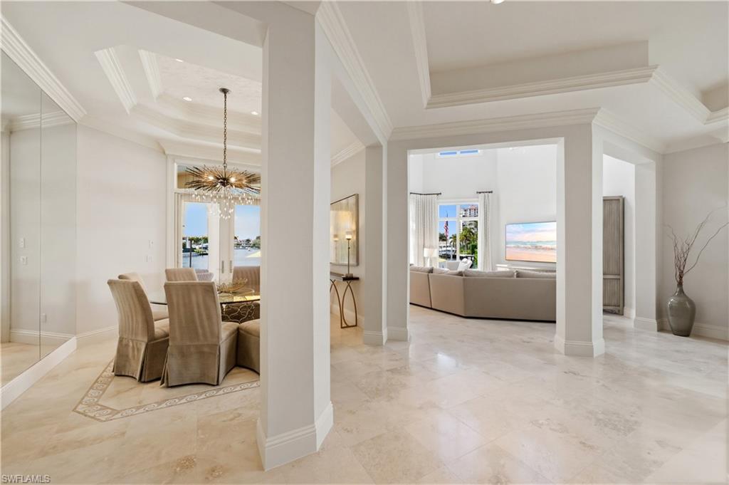 361 Pirates Bight Naples, FL 34103 - Photo 15 of 45 a view of a livingroom with furniture and front door
