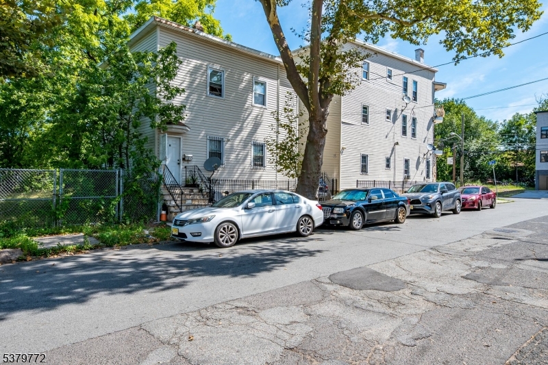 369 21st Street Irvington, NJ 07111 - Photo 16 of 16 a view of car parked in front of house