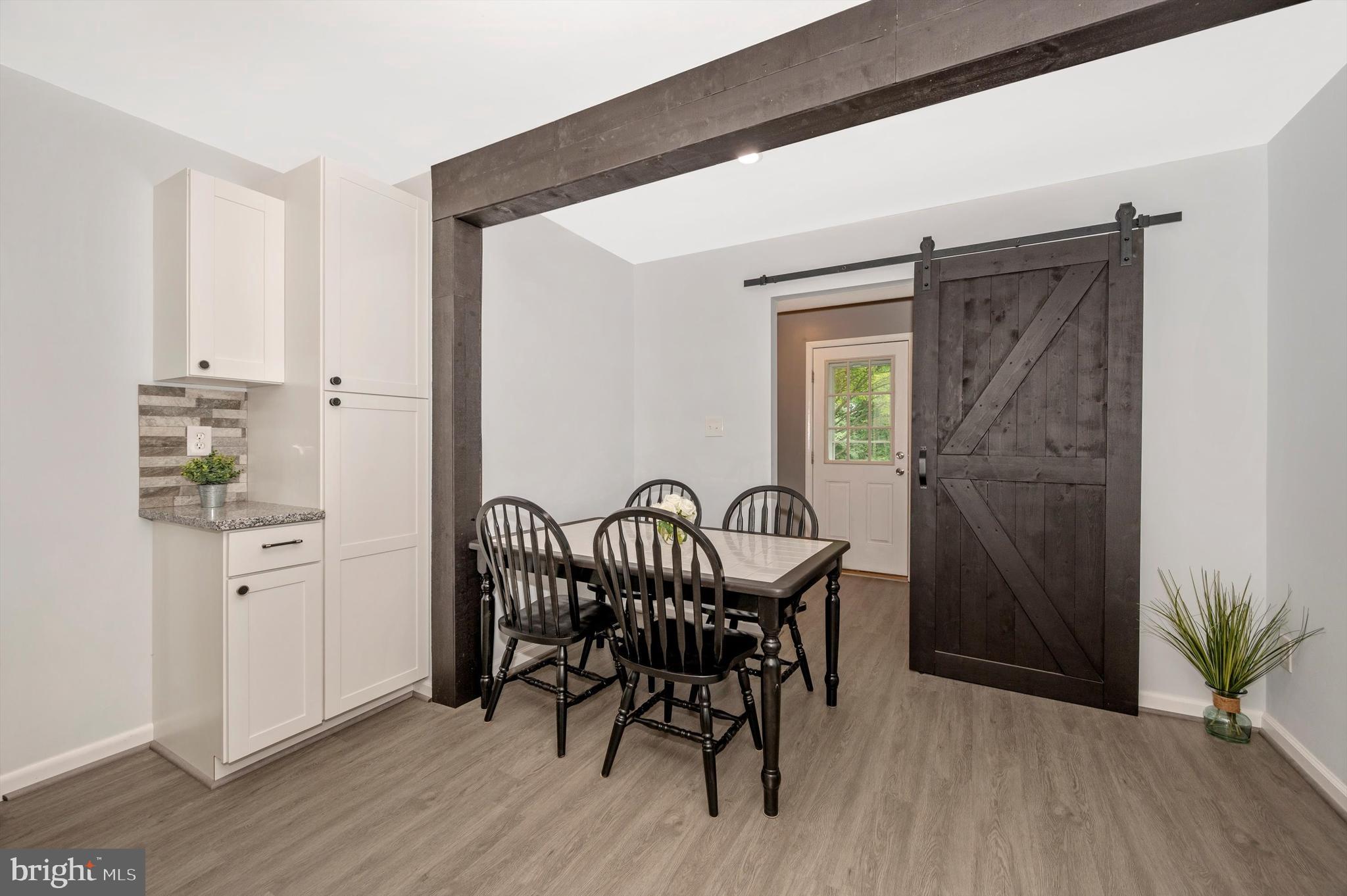 429 Quaker Hill Road Union Bridge, MD 21791 - Photo 16 of 43 Kitchen has Barn Door to Laundry/Mud Room