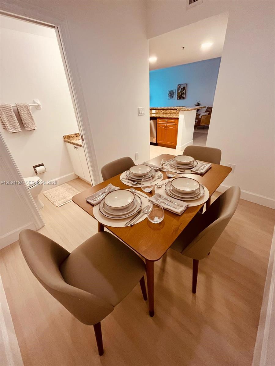 120 South Douglas Road, Unit 302 Miami, FL 33134 - Photo 11 of 28 a workspace with furniture and window