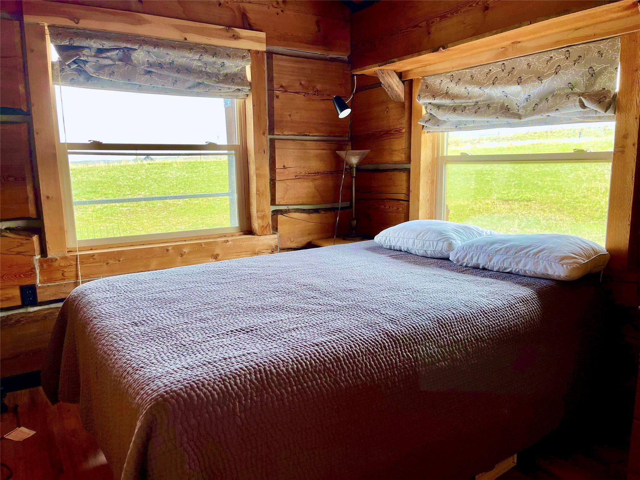 36 South Shore Road Babb, MT 59411 - Photo 6 of 21 Bedroom with wood walls