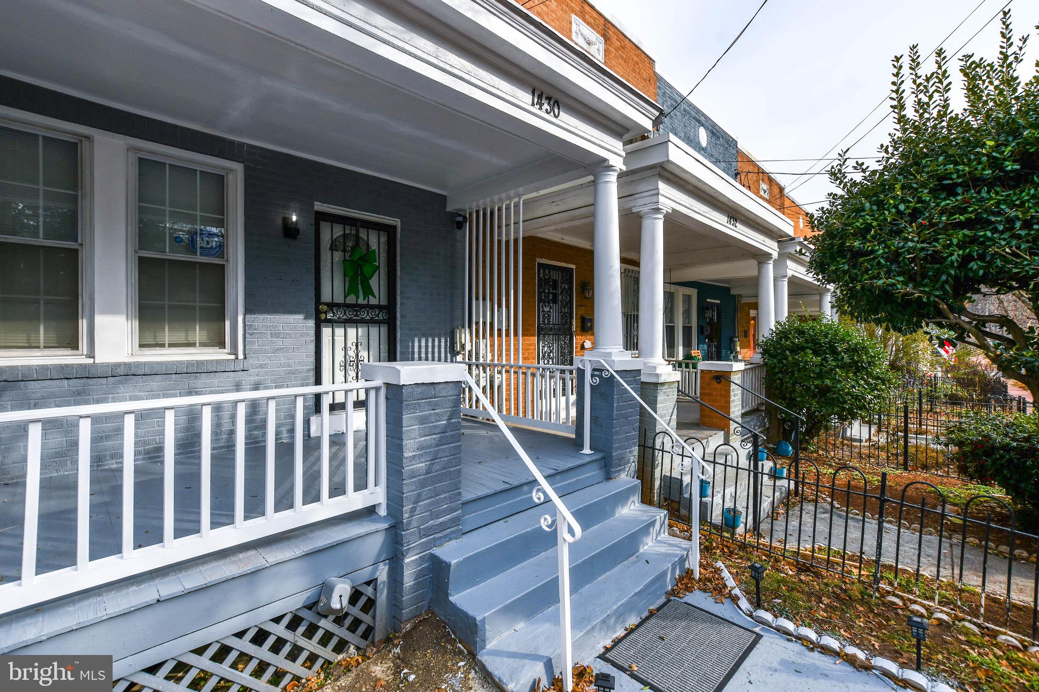 1430 W Street Southeast Washington, DC 20020 - Photo 5 of 41 a view of a house with wooden porch