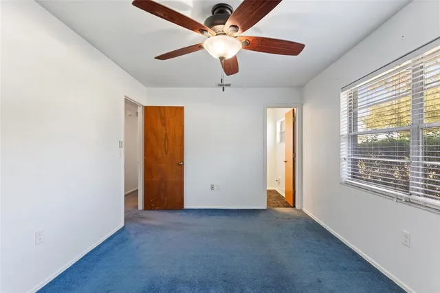 a bathroom with a sink a mirror and a toilet