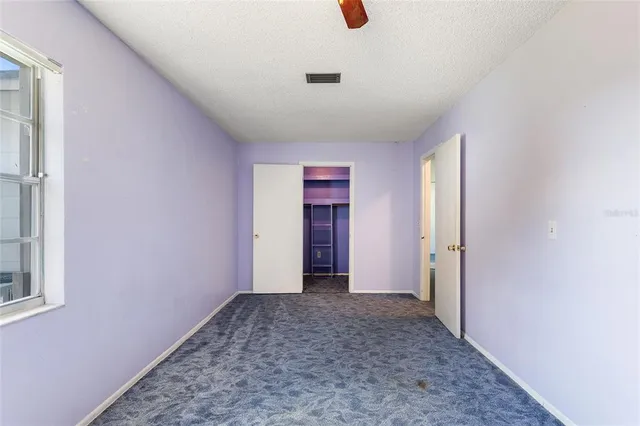 a bathroom with a sink a toilet a shower and a mirror