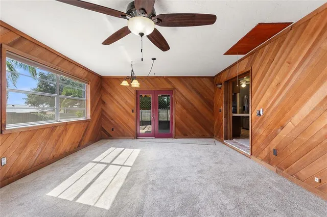 a kitchen with a stove a sink and a refrigerator