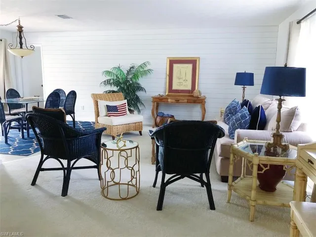 a living room with furniture and a couch