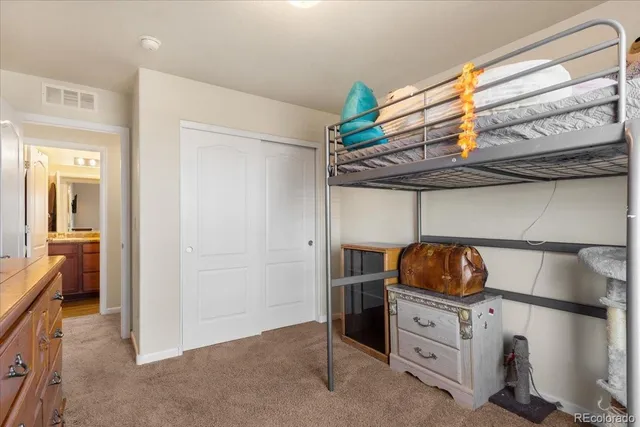 a kitchen with stainless steel appliances a stove and a refrigerator