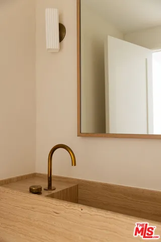 a picture of a bench in a bathroom