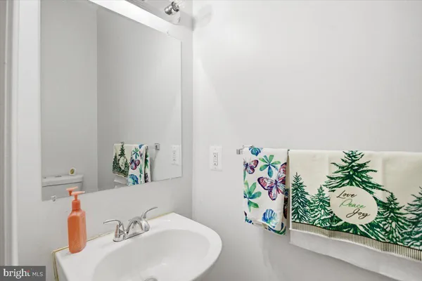 a bathroom with a sink and a bathtub