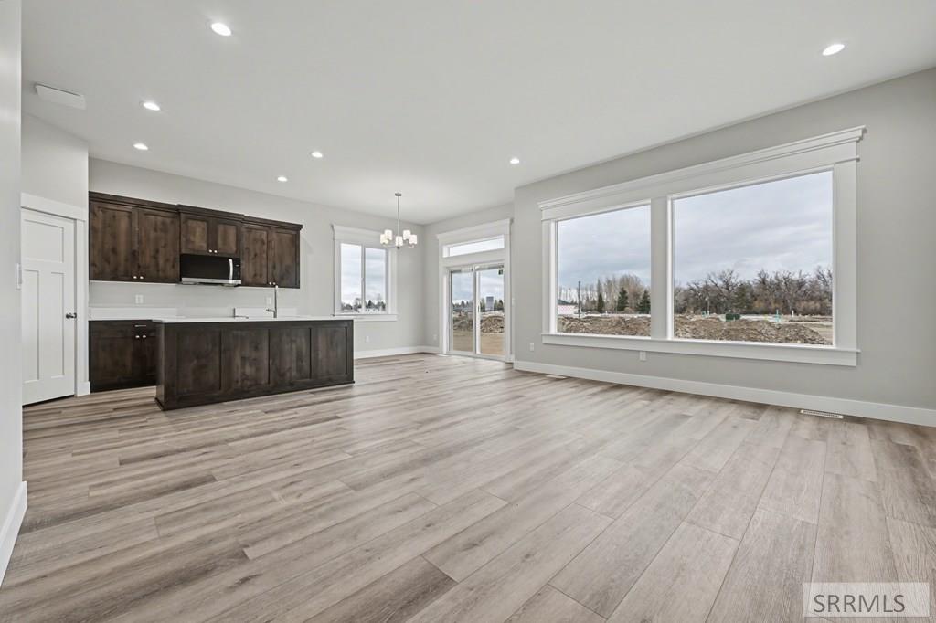 534 Fieldstone Drive Rigby, ID 83442 - Photo 2 of 15 Great Room to Kitchen/Dining Area