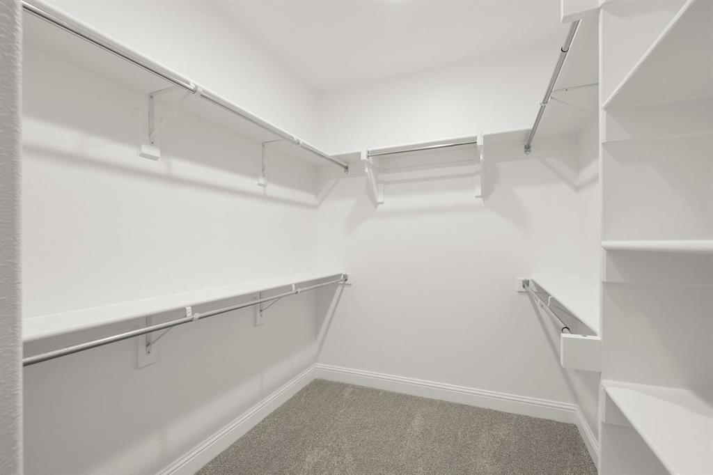2143 Rhodora Avenue Forney, TX 75126 - Photo 13 of 29 Primary Walk-In Closet - Representative Photo
