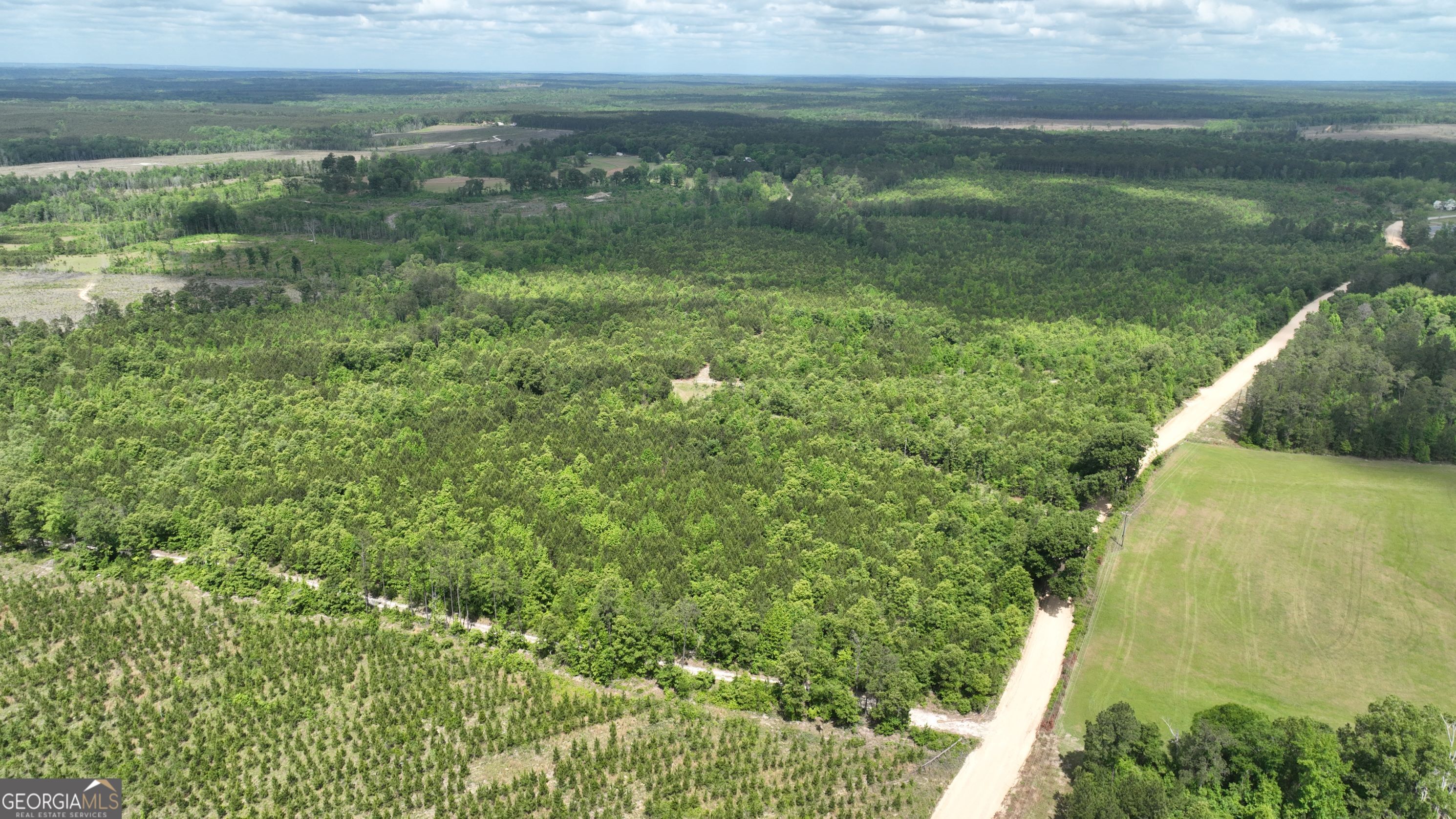0 North Indian Trail Road Sandersville, GA 31082 - Photo 6 of 6 a view of a lake with a yard