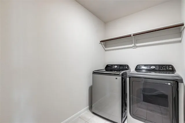 a bathroom with a double vanity sink a and mirror