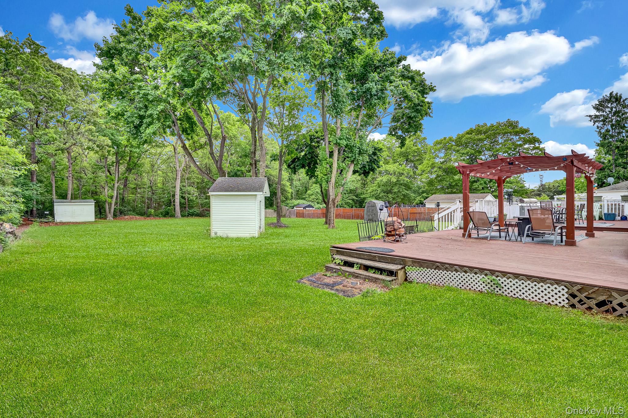 98 Granny Road Farmingville, NY 11738 - Photo 21 of 24 a view of a park with furniture