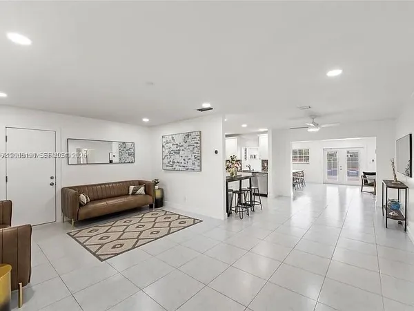 a living room with furniture and a couch