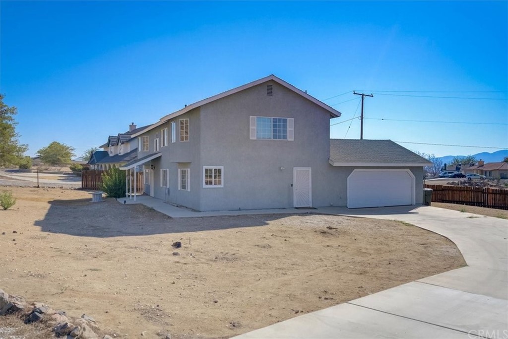 15993 Rancherias Road Apple Valley, CA 92307 - Photo 1 of 1 a view of a house with a outdoor space