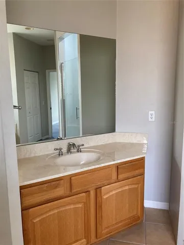 a sink with a mirror