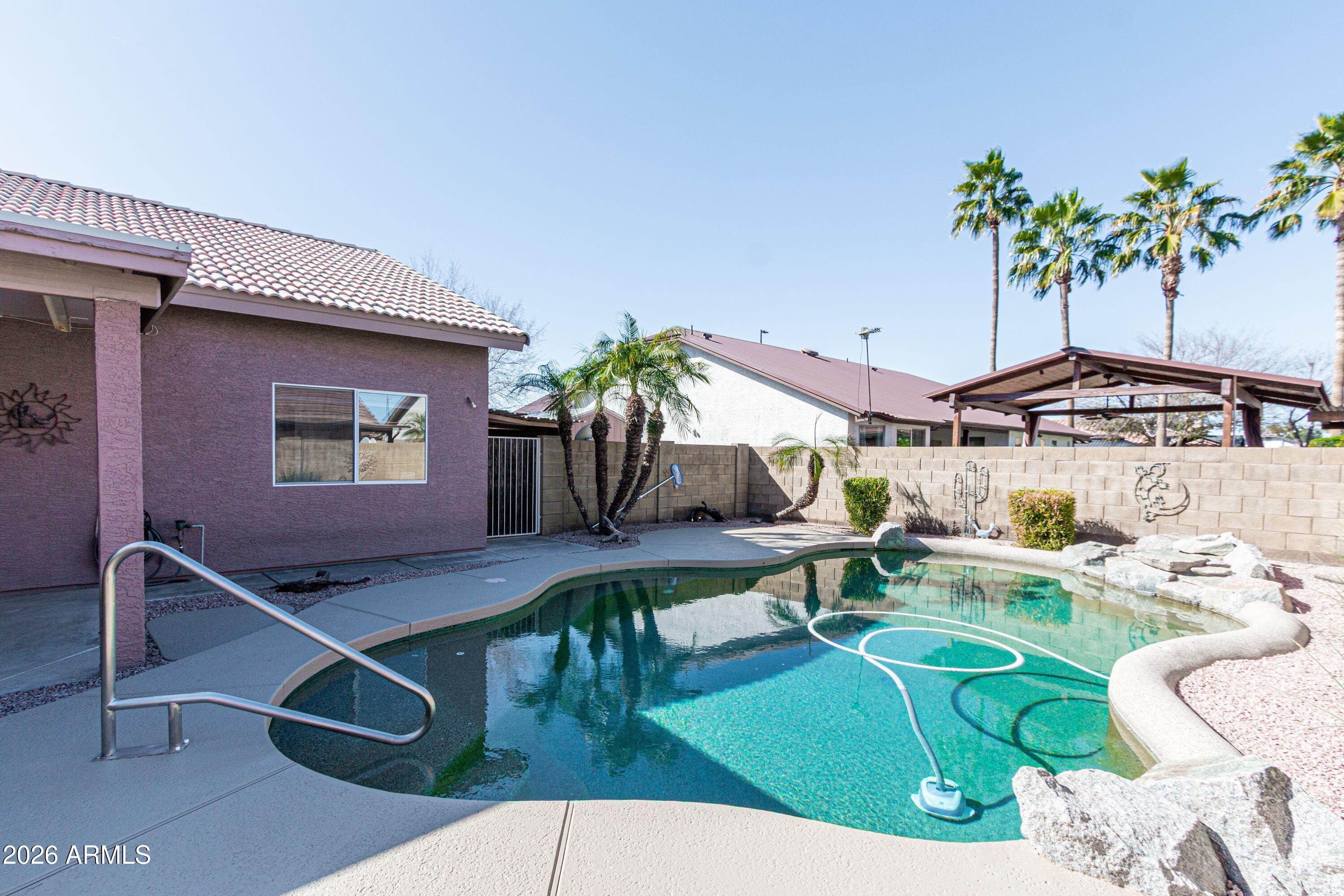 450 East Merrill Avenue Gilbert, AZ 85234 - Photo 19 of 26 a living room with furniture