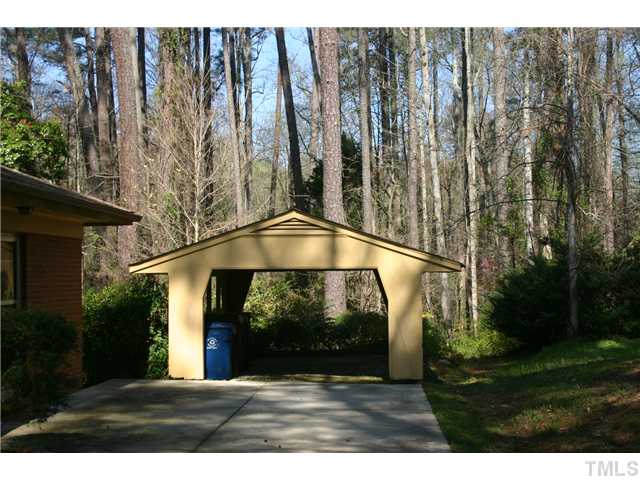 3936 Hope Valley Road Durham, NC 27707 - Photo 10 of 10 The detached carport is behind a 2 car concrete pad for easy parking.