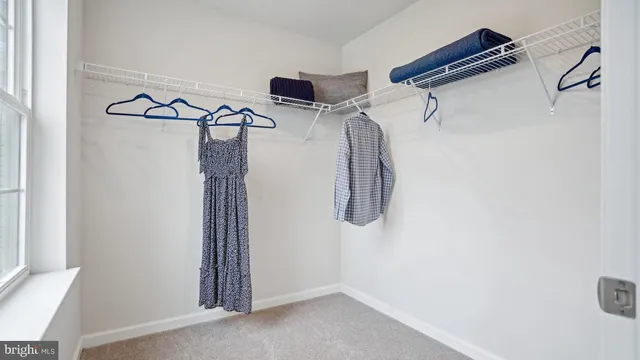 a view of a room with rack on the wall