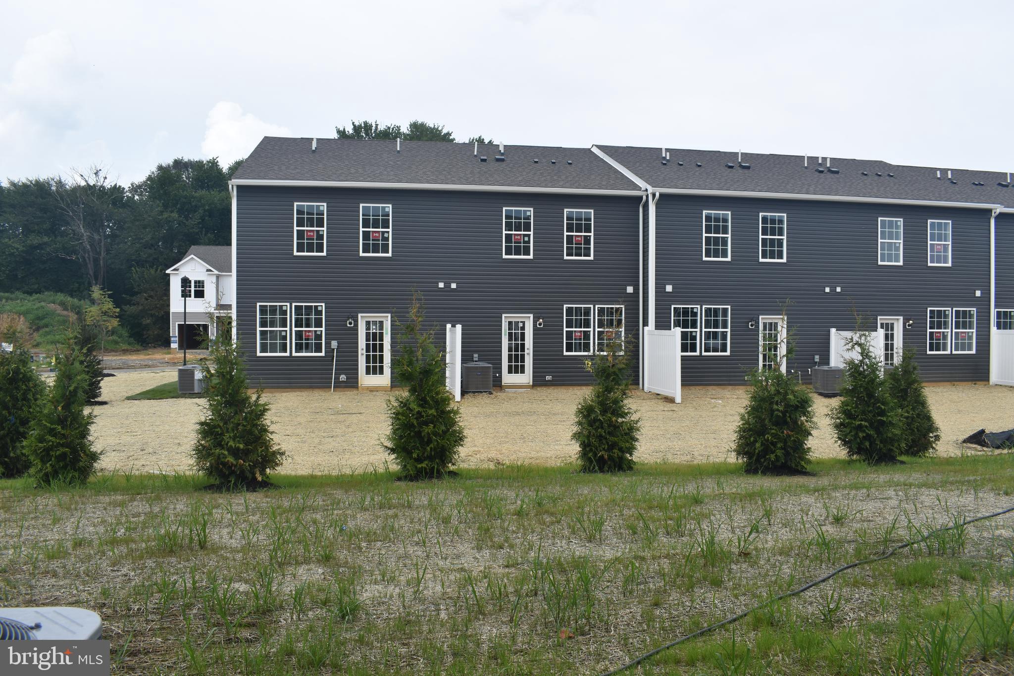80 Alexander Way Westampton, NJ 08060 - Photo 2 of 45 a front view of a house with a yard