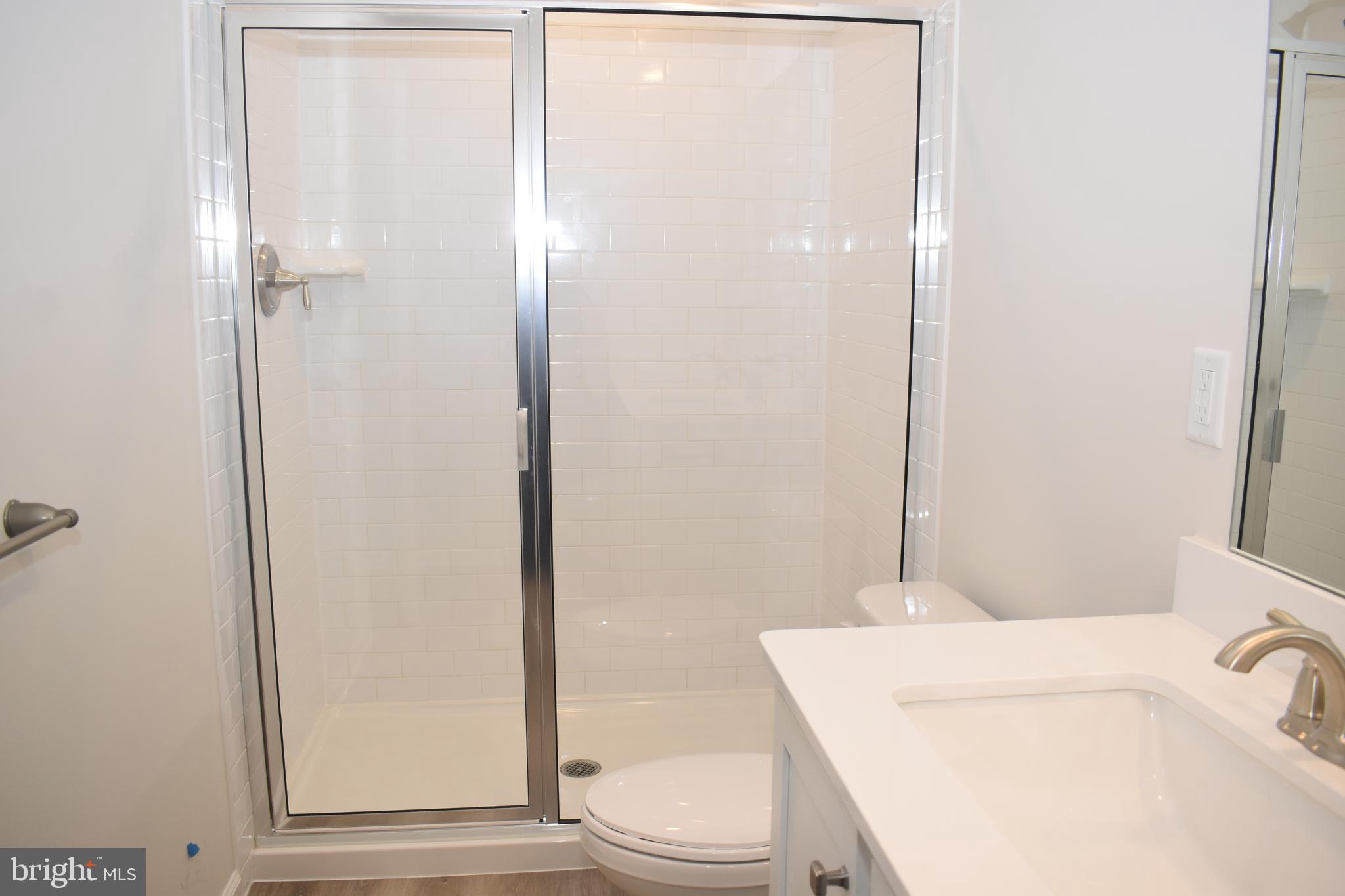 80 Alexander Way Westampton, NJ 08060 - Photo 36 of 45 a bathroom with a sink a toilet and shower