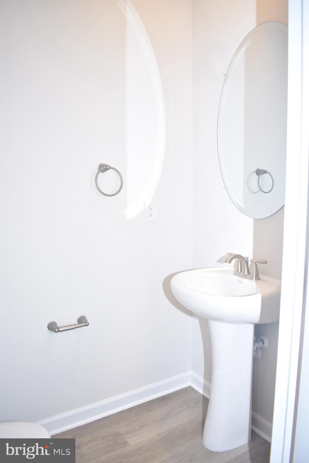 80 Alexander Way Westampton, NJ 08060 - Photo 43 of 45 a bathroom with a sink a mirror and shower