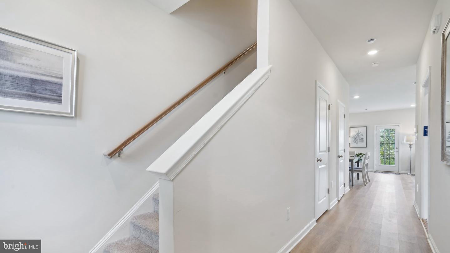 80 Alexander Way Westampton, NJ 08060 - Photo 8 of 45 a view of hallway with wooden floor
