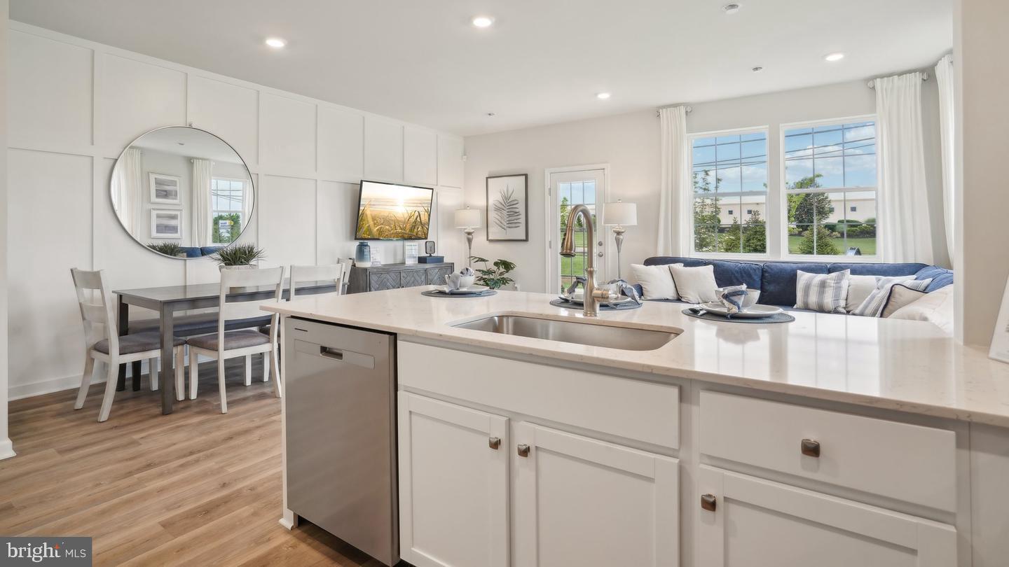 80 Alexander Way Westampton, NJ 08060 - Photo 10 of 45 a kitchen with stainless steel appliances a sink a stove window and cabinets