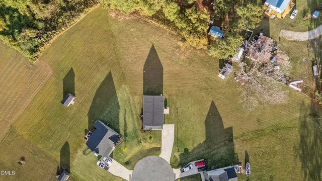 an aerial view of residential house with outdoor space