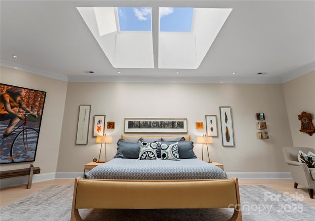 a bedroom with a bed and dresser