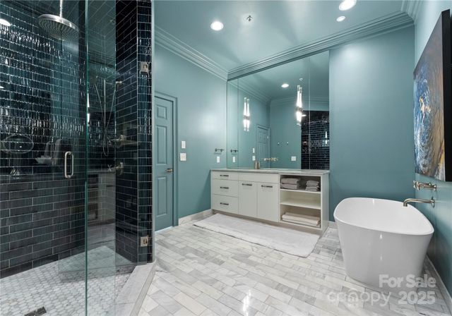 a bathroom with a toilet sink and shower