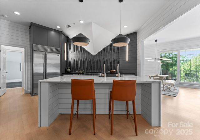 a room with furniture and a large window