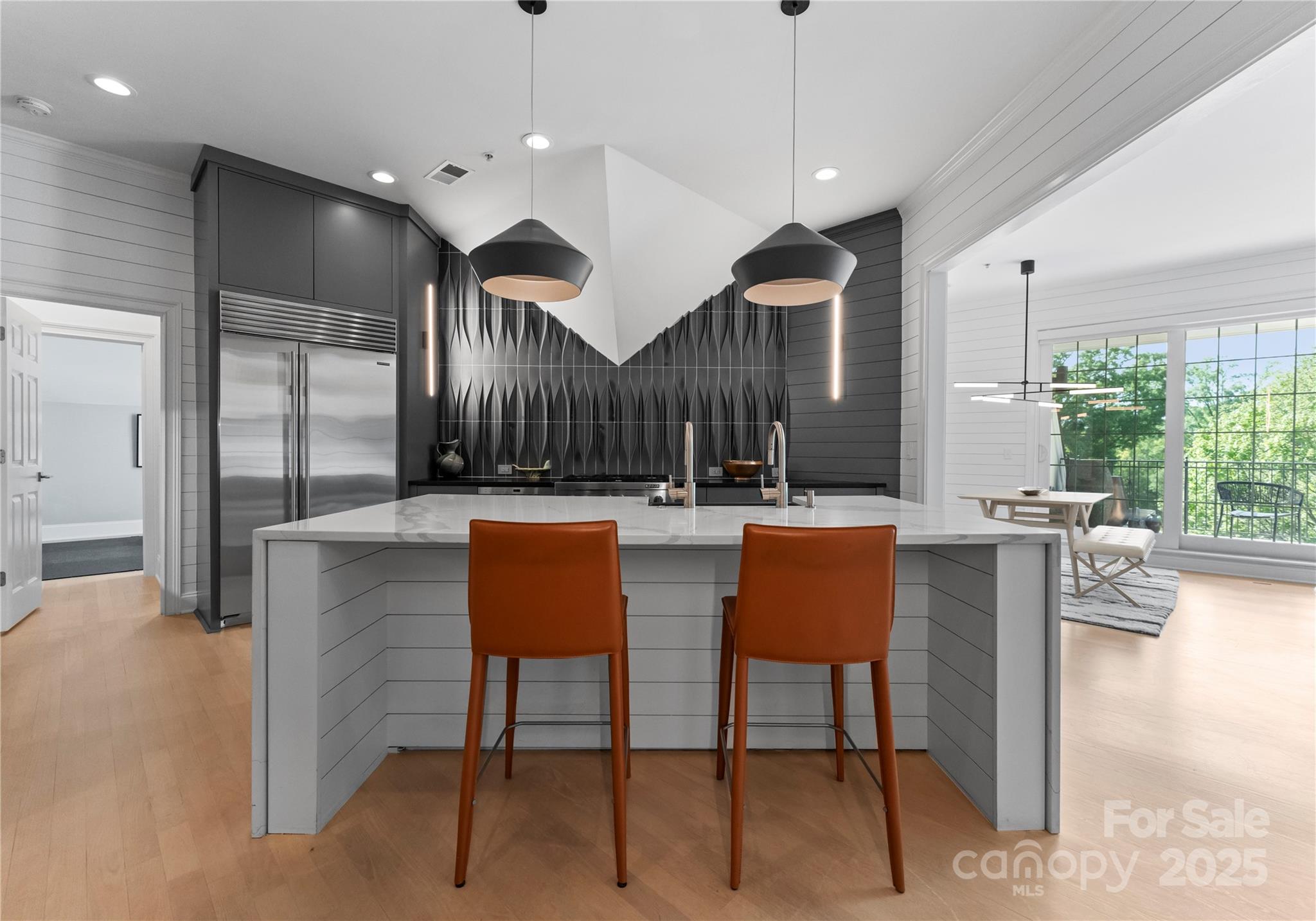 974 Queens Road Charlotte, NC 28207 - Photo 8 of 26 a room with furniture and a large window