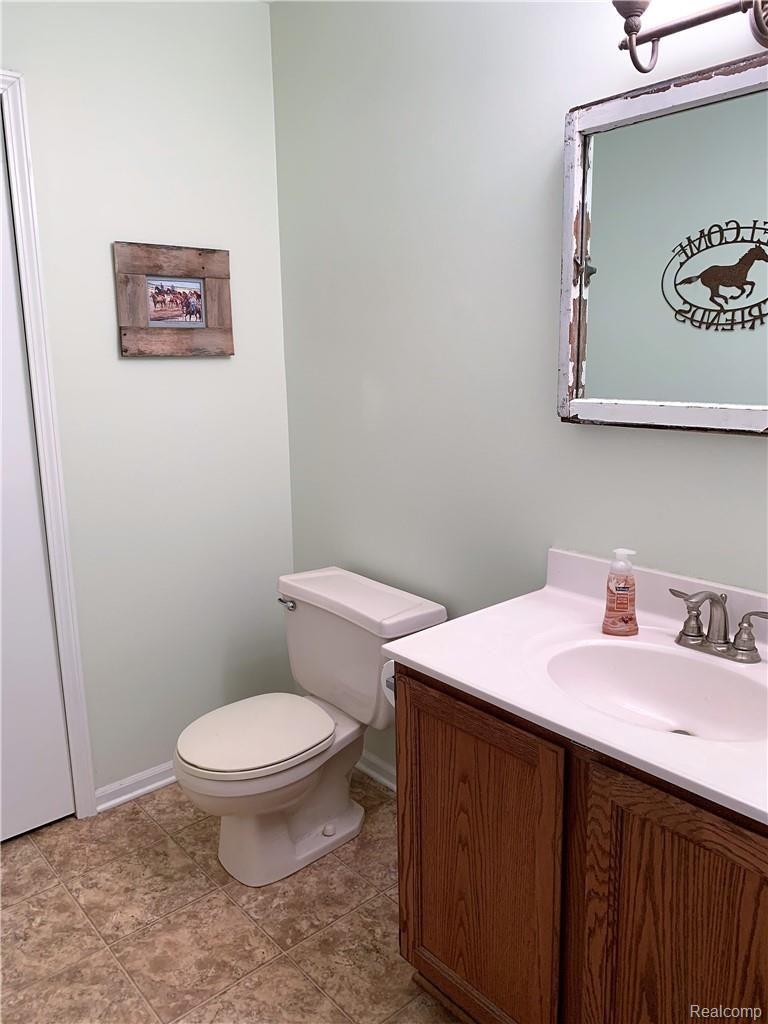 3148 Beck Road Howell, MI 48843 - Photo 12 of 34 main floor 1/2 bath