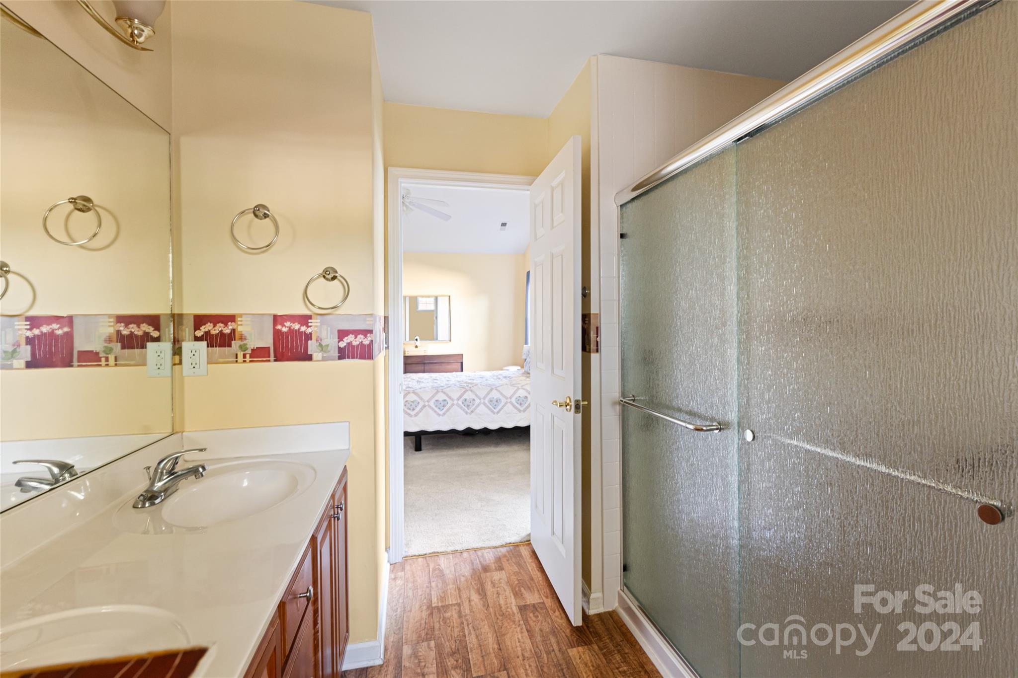 183 Lumber River Road Fletcher, NC 28732 - Photo 20 of 31 a bathroom with a tub sink shower and mirror