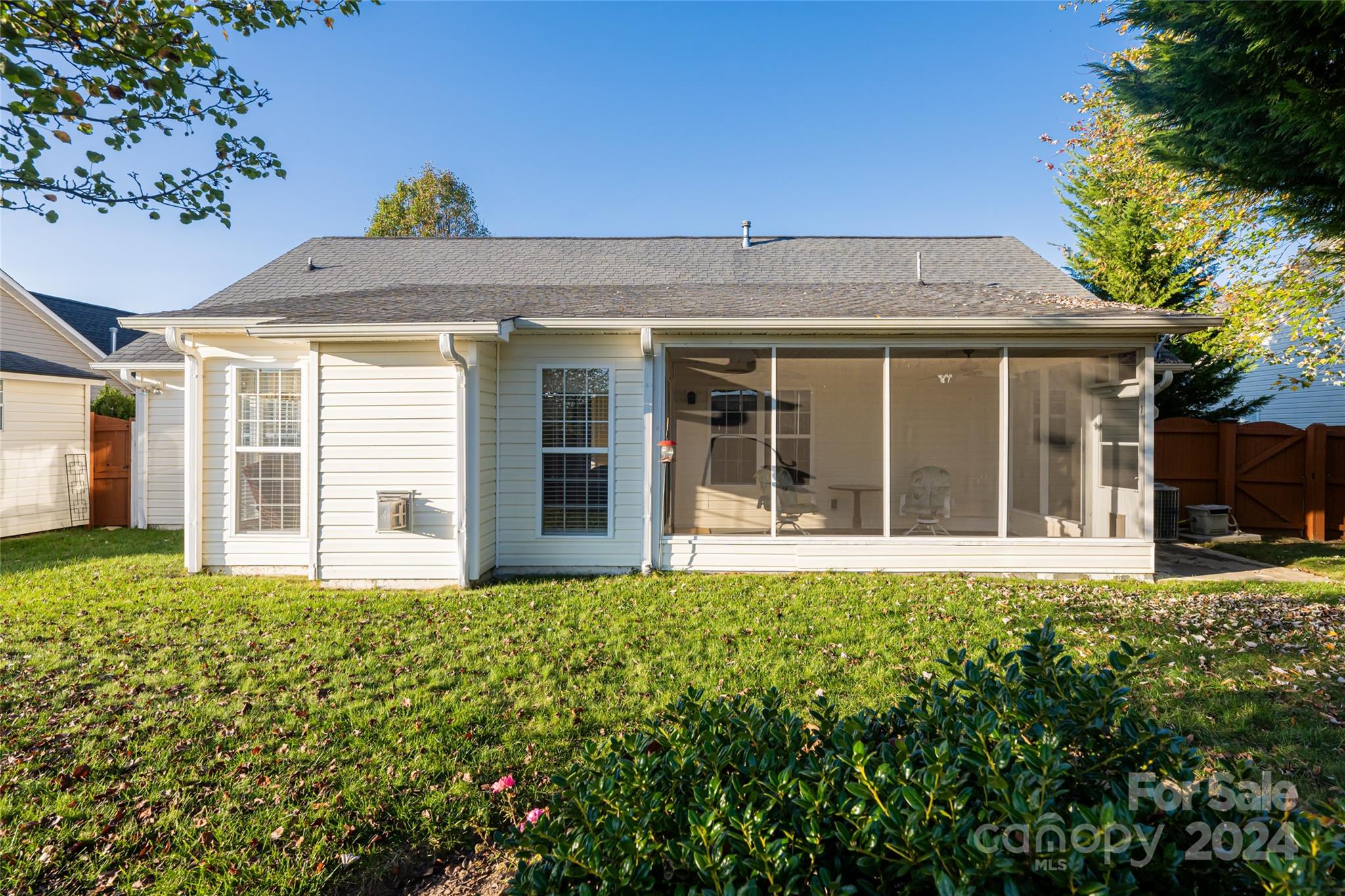 183 Lumber River Road Fletcher, NC 28732 - Photo 27 of 31 front view of a brick house with a large window