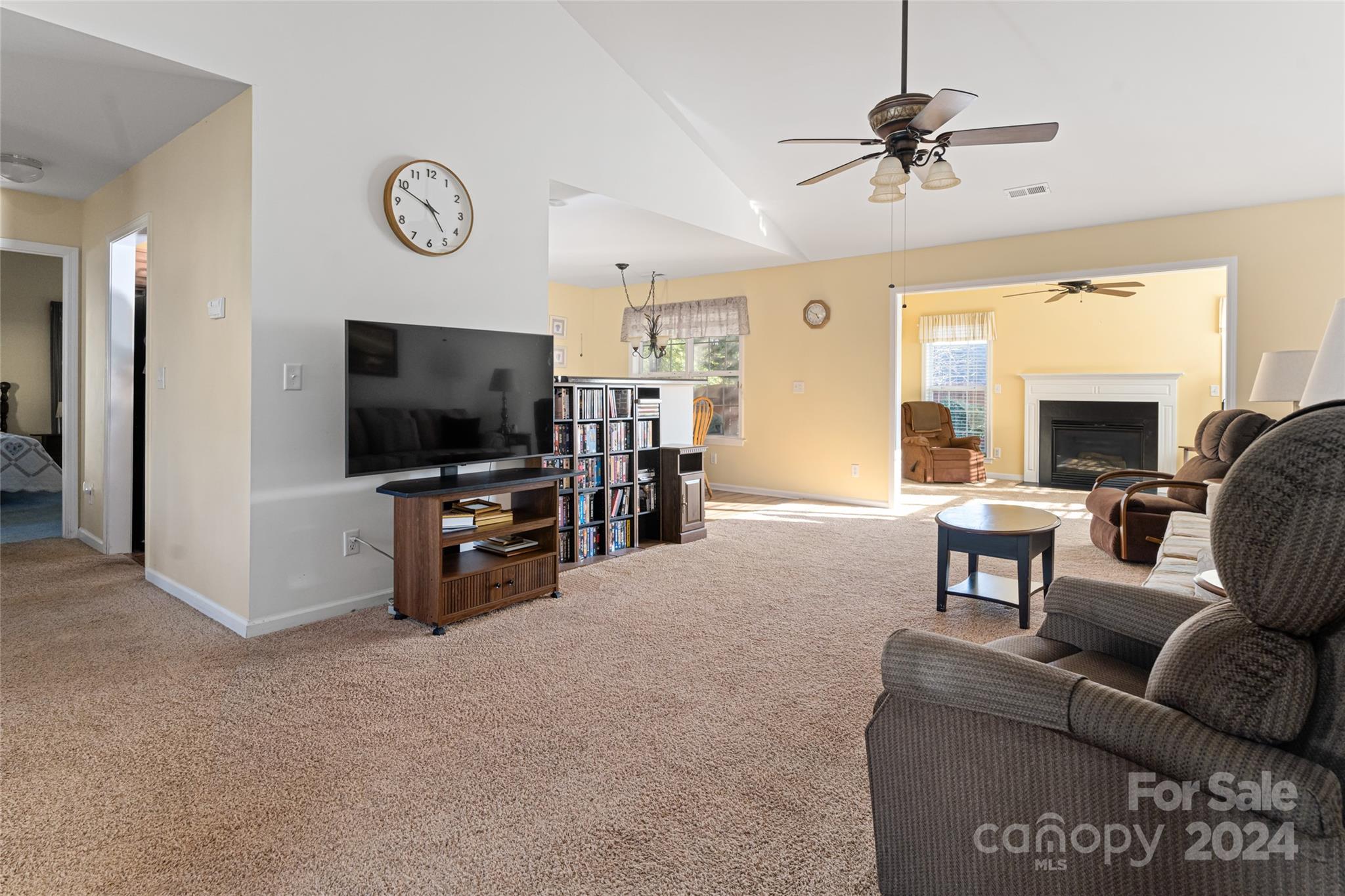 183 Lumber River Road Fletcher, NC 28732 - Photo 7 of 31 a living room with furniture and a flat screen tv