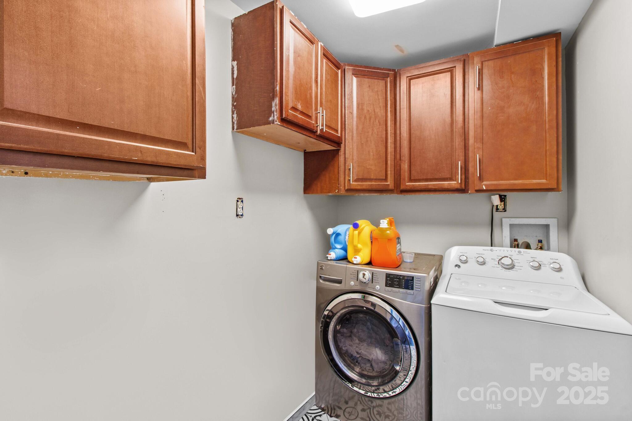 1493 Swicegood Road Linwood, NC 27299 - Photo 34 of 45 a utility room with dryer and washer